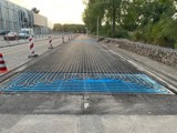 Warmte genererende asfaltstrook